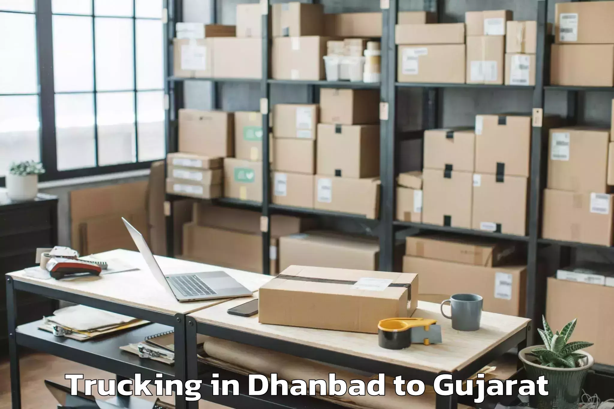 Reliable Dhanbad to Manavadar Trucking